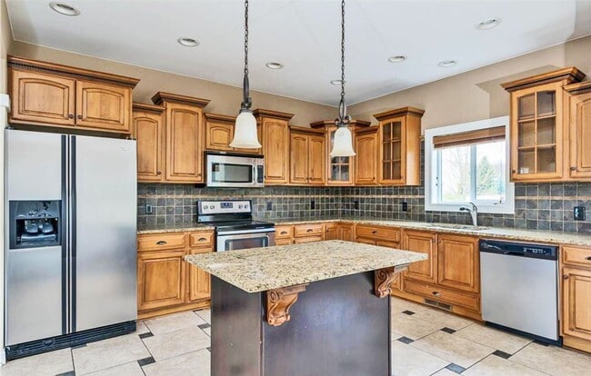 Building Photo - Jumbo-Sized 2-Story on Huge Corner Lot, Play Gym, 3-Car Garage, Bonus Room-Office, Pets OK!