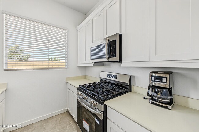 Building Photo - 9654 W Mitchell Dr