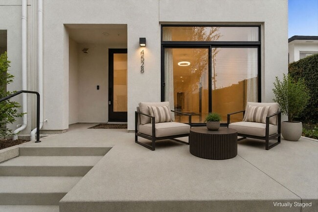 Building Photo - Modern 4-Bed with Rooftop Balcony & Dual Primary Suites