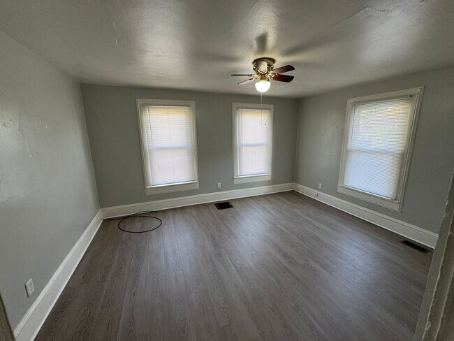 Building Photo - Interested in a two-bedroom house that includes a large garage. Please let us know