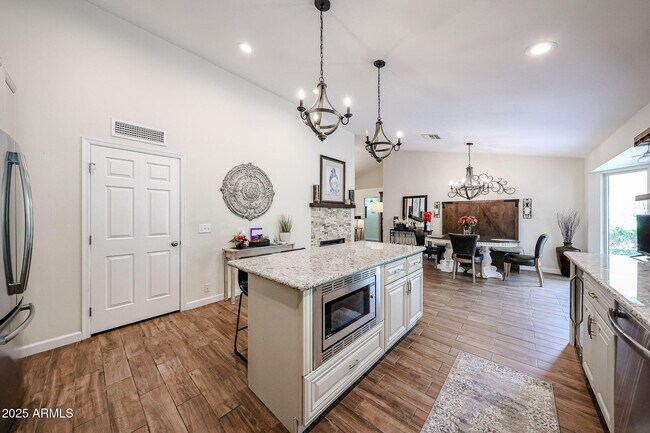 Building Photo - 9085 E Windrose Dr