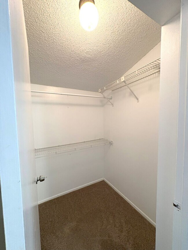 Building Photo - Charming 2-Bed, 2-Bath Home with Vaulted C...