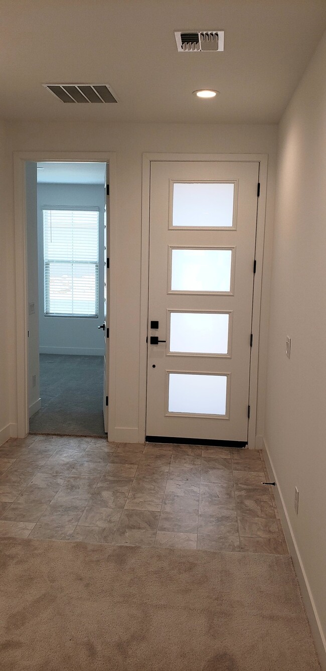 Building Photo - The 2 YEARS NEW 4 bedroom + 3 car garage r...