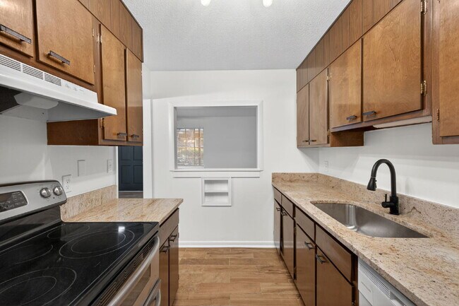 Building Photo - Move-In Ready 2BR Condo | Pool Access & Water Included