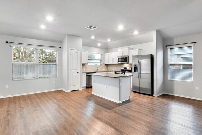 Building Photo - $300 off One Month's Rent! Charming Home with Elegant Granite Countertops and Cabinets