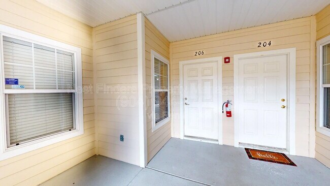 Building Photo - 8241 Pelican Landing Rd