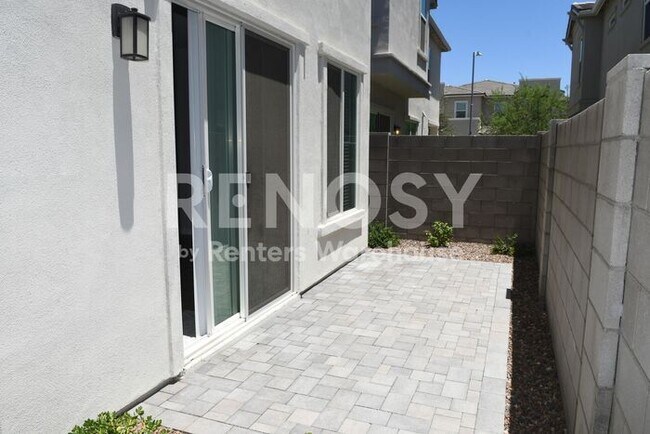 Building Photo - Price Improved – Spacious Townhome in a Gated Community!