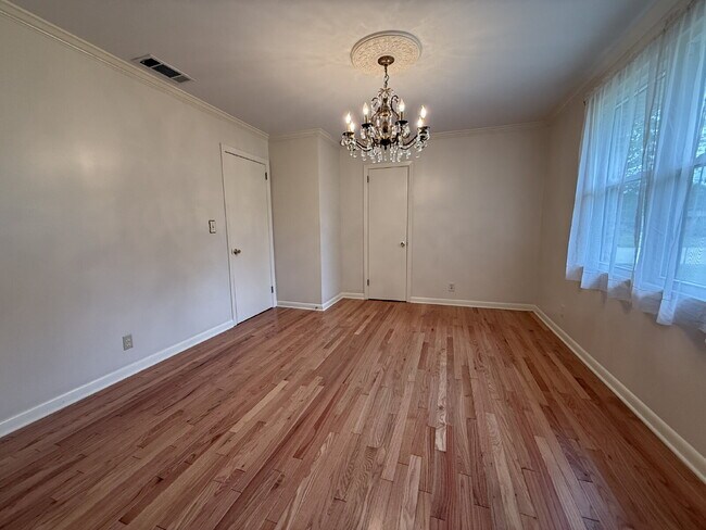 Building Photo - Modern Comforts with Granite & Hardwood Finishes!" 3 Bedroom 2 bath home.