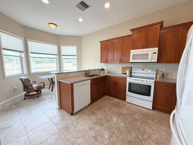 Building Photo - "Unfurnished Home on Golf Course in Hudson, FL - Spacious 1,853 Sq Ft Haven!"