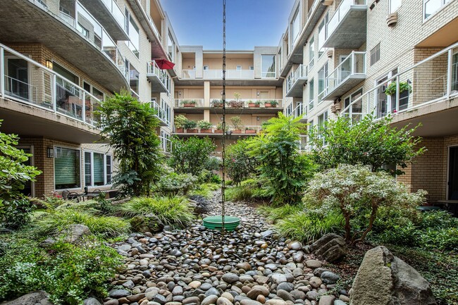 Building Photo - Sweet + secure 1/1 condo with parking, extra storage room + AC available now!