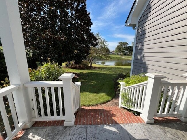 Building Photo - Welcome to Elegant Living in the Charming Porters Neck Plantation Community!