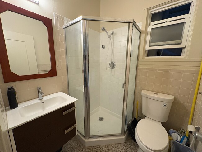 Bathroom with new vanity and sink (shared with 1 tenant) - 453 20th Ave