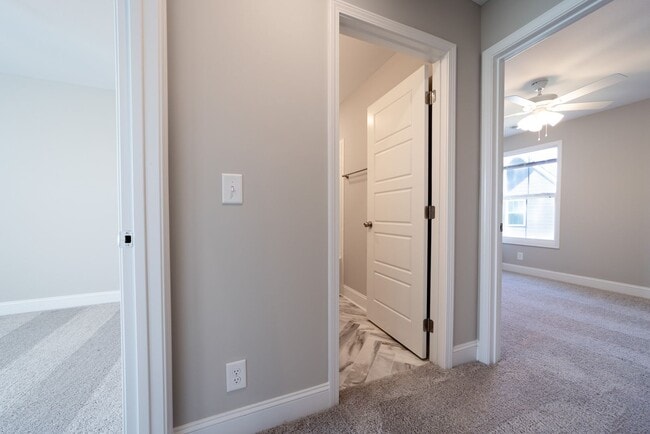 Building Photo - Elegant Home with Stone Fireplace, Kitchen Island and Designer Primary Suite