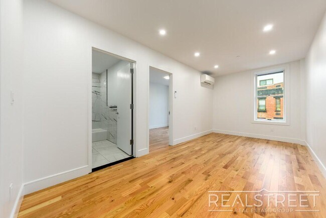 Building Photo - Modern New Construction 1-Bedroom Apartmen...