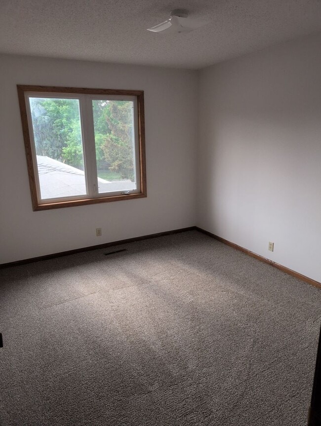 Building Photo - Fully Updated 3 Bedroom 3 Bath Townhouse with 2 Stall Attatched Garage