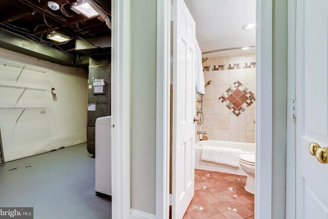 Hallway to utility and storage room - 116 9th St SE