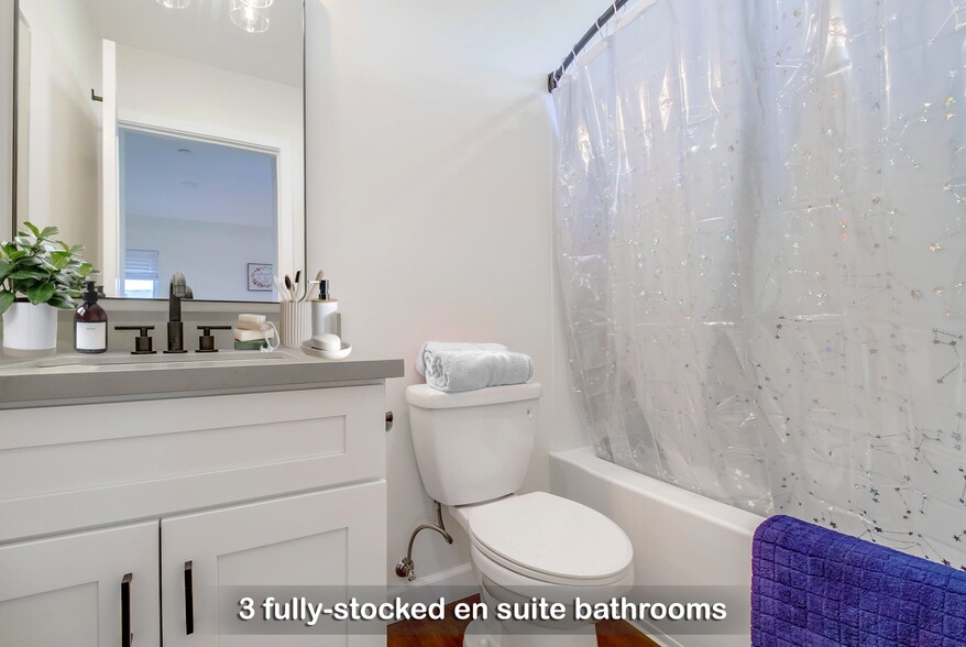 Our fully stocked bathrooms include soap, shampoo, plush towels, and a hair dryer. - 723 E 22nd St