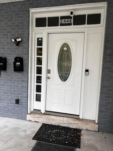 Main Entrance - new porch, stairs & privacy fence with gate - 2448 Lakeview Ave