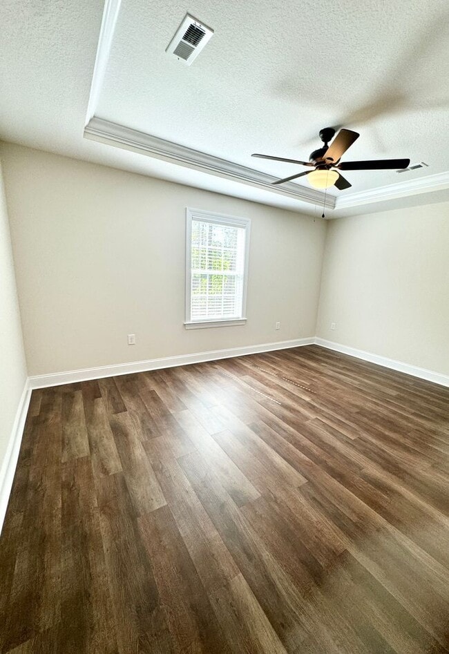 Building Photo - BEAUTIFUL pond front home! All the details make this a showstopper.! Fenced Yard!!