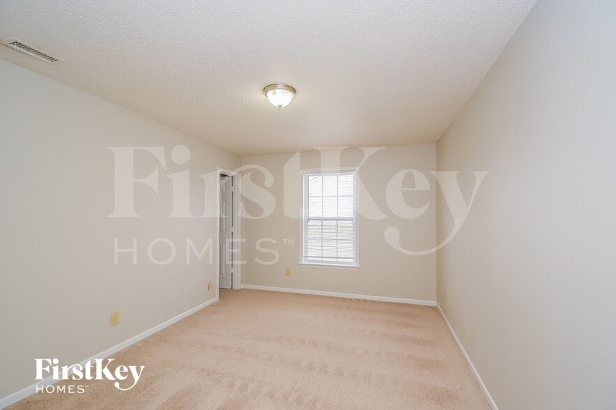 Building Photo - 5661 Grassy Bank Dr