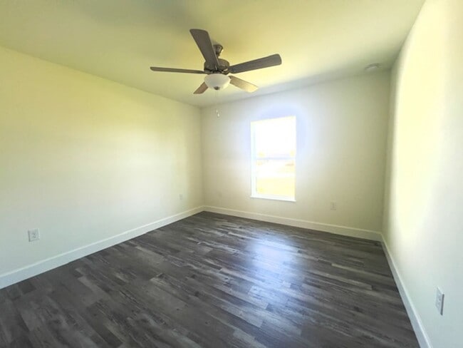 Building Photo - Available Now!! NW CAPE CORAL - 4 Bedrooms - 3 Bathrooms - 2 Car Garage