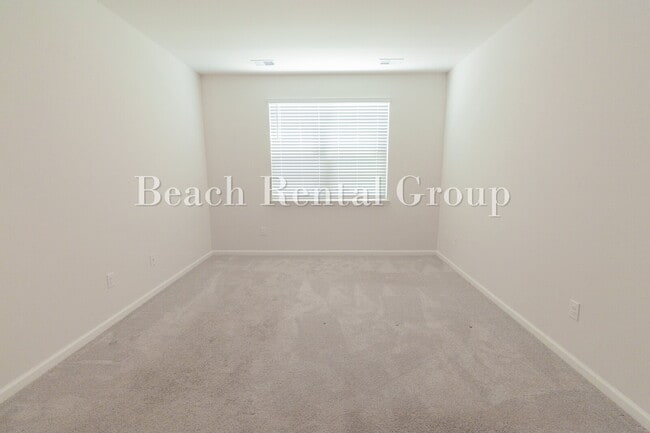 Building Photo - Spacious 4 Bedroom with Pond View