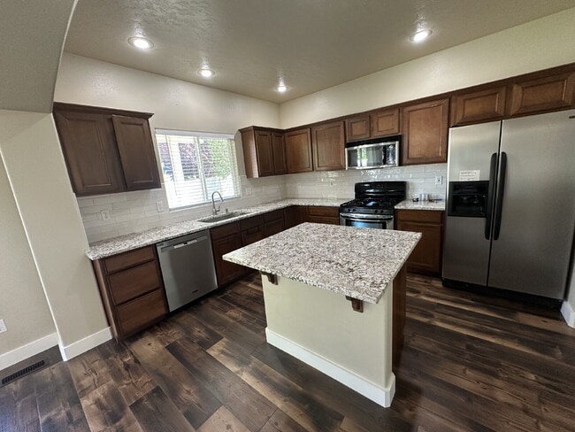 Building Photo - "Charming 4-Bed Home with Granite Accents & Hardwood Elegance in Meridian!"