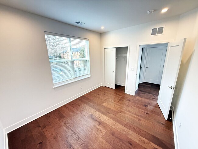 Building Photo - Brand new 4 level, 4 Bedroom Townhome with Elevator!