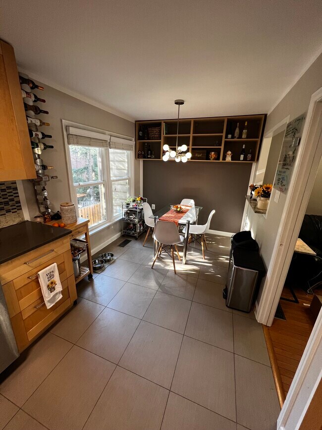 Dining Room FURNISHED: w/ table, chairs, & wine rack - 3814 Usher Ct