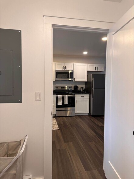View from laundry room into kitchen - 137 Lebanon Rd