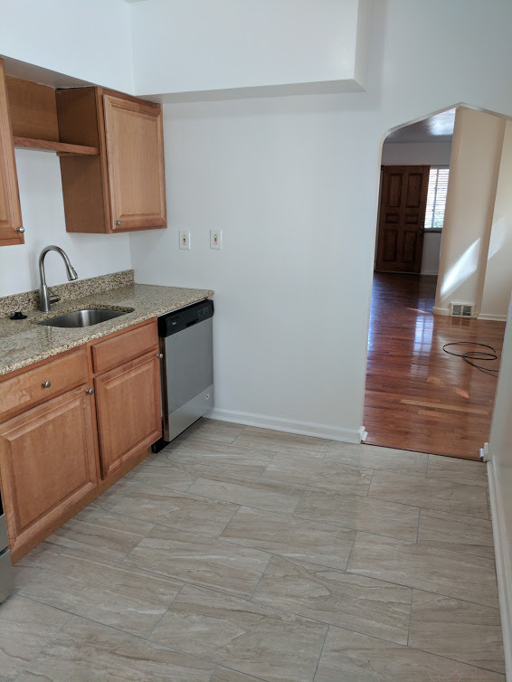 Building Photo - Check out this Totally Updated First Floor Duplex! 2BR+Den