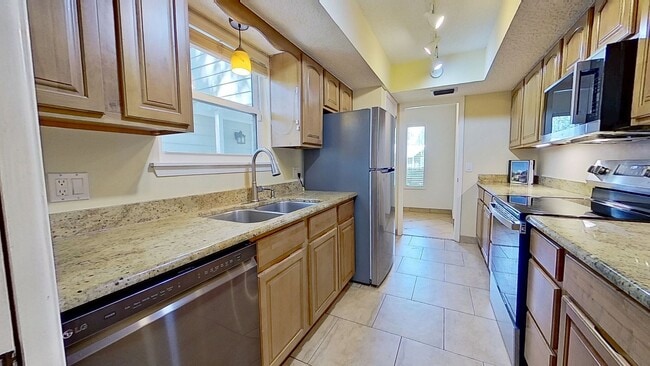 Building Photo - Beautiful Two-Story Home in Neptune Beach availabe early May!