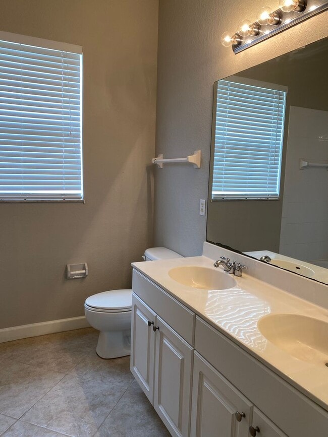 Building Photo - SPACIOUS 3/2 IN SAINT JAMES GOLF COMMUNITY