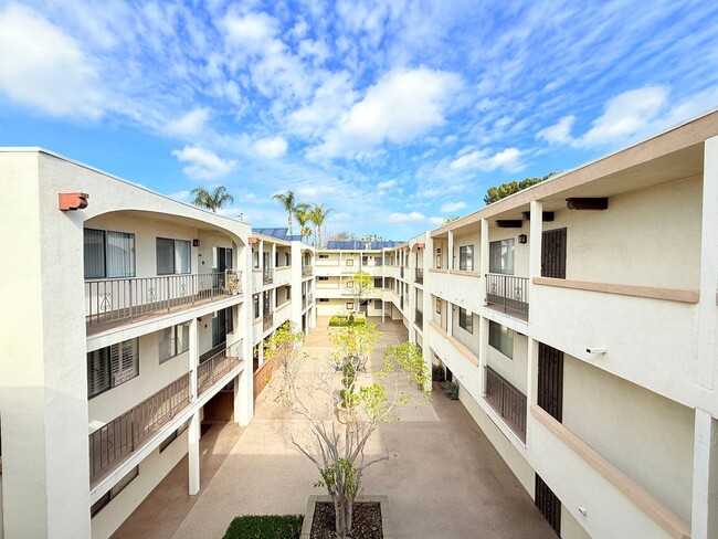 Building Photo - Stylish & Spacious 2-Bedroom Condo for Ren...