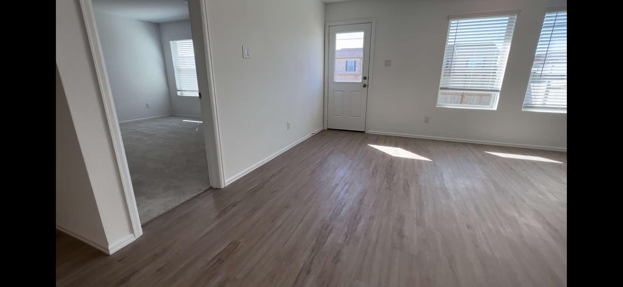 Living room to backyard and main bedroom - 274 Bennett Loop