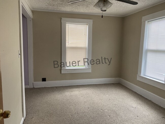 Building Photo - Three Bedrooms, One and a Half Baths