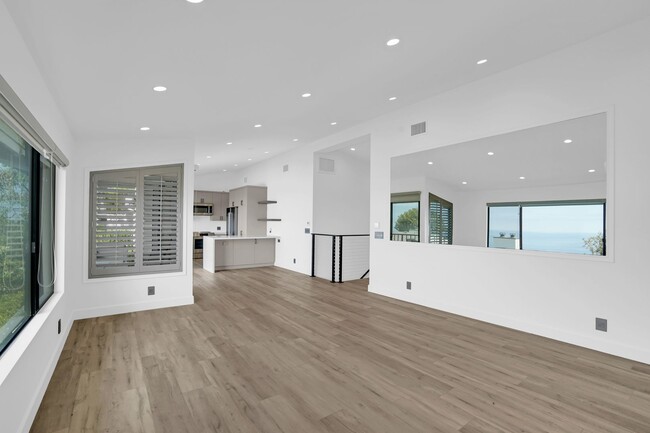 Building Photo - Coastal Bliss Awaits: Luxurious 3-Bed, 3.5...