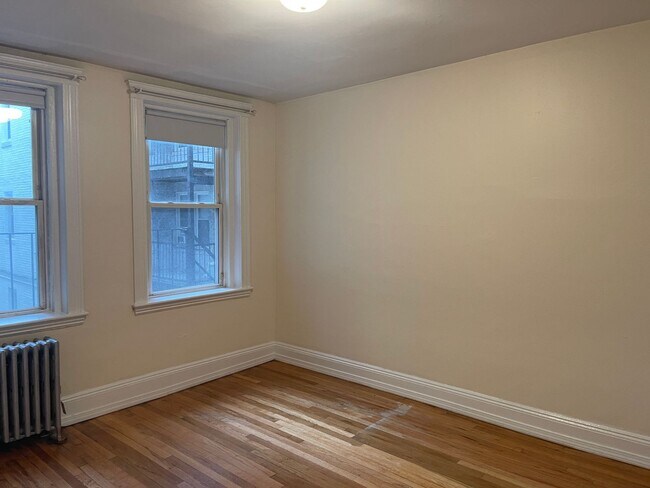 Building Photo - Renovated 1  bed , Sunny and Spacious, Utilities and laundry Inc Close to train 1 free Month