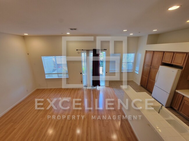 Building Photo - Spacious 3/2.5 Located In Communication Hills, With Two 1 Car Garages, W/D & Large Master Retreat
