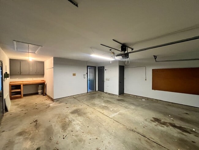 Building Photo - Step into this inviting, sunlit home where space and comfort blend seamlessly