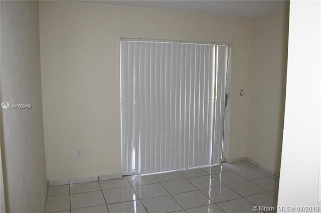 Building Photo - 4680 NW 102nd Ave  104-20