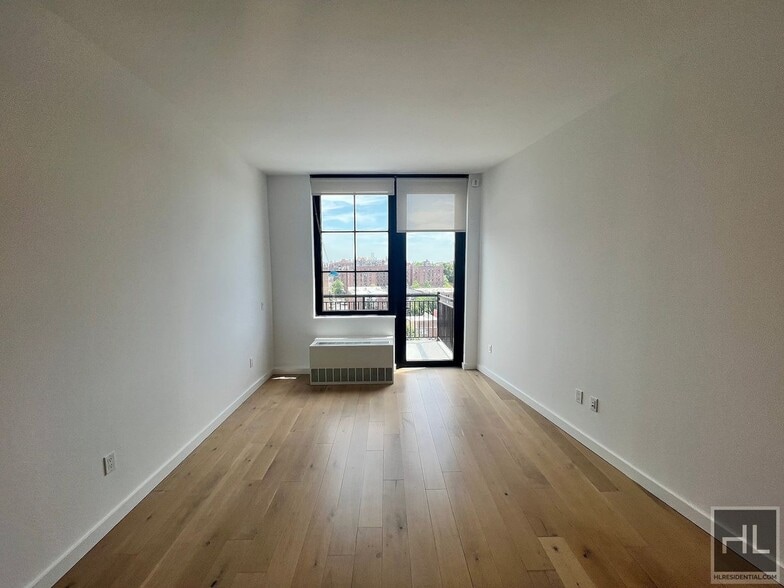 Building Photo - Northern Blvd | Flushing | Penthouse, 1BR/1BA w/Private Balcony, W/D & NO Broker's Fees!