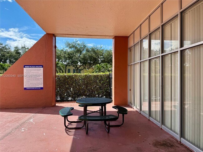 Building Photo - 4675 W 18th Ct