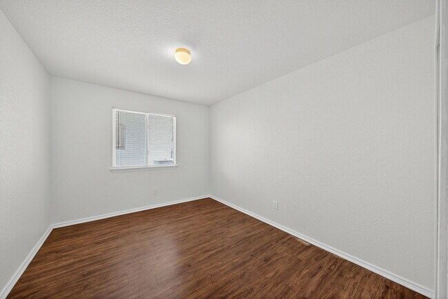 Building Photo - 4935 Dahlia Terrace