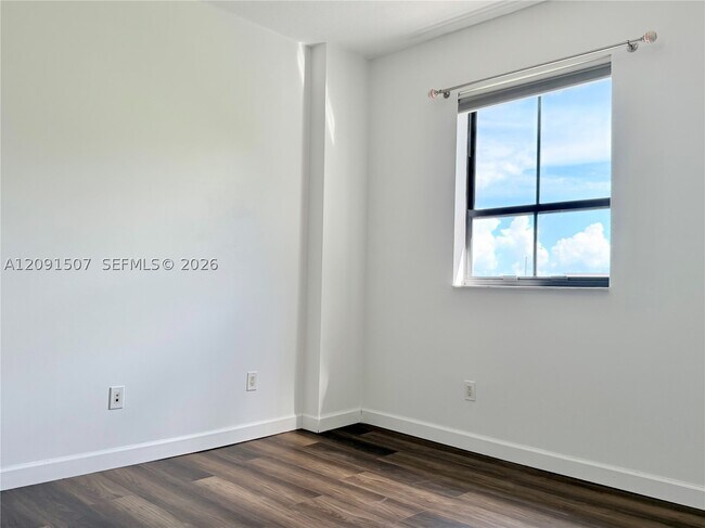 Building Photo - 8390 SW 72nd Ave