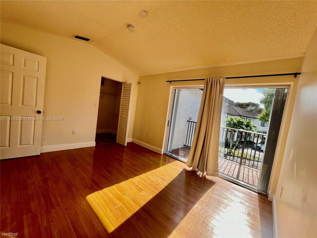 Building Photo - 3 br, 2.5 bath Condo - 8625 SW 152nd Ave A...