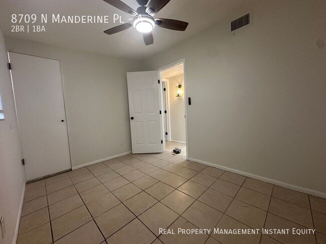 Building Photo - 8709 N Mandarine Pl