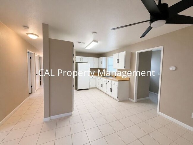 Building Photo - Spacious 4-Bedroom Home with 2-Car Garage & Backyard Oasis