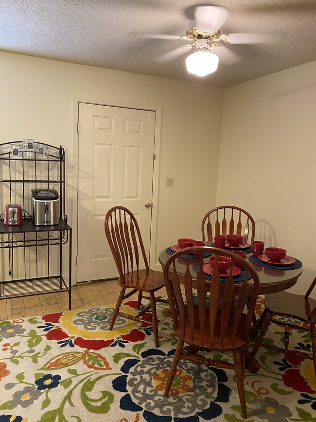 Dining area in kitchen and patio outside door - 114 Michael Dr