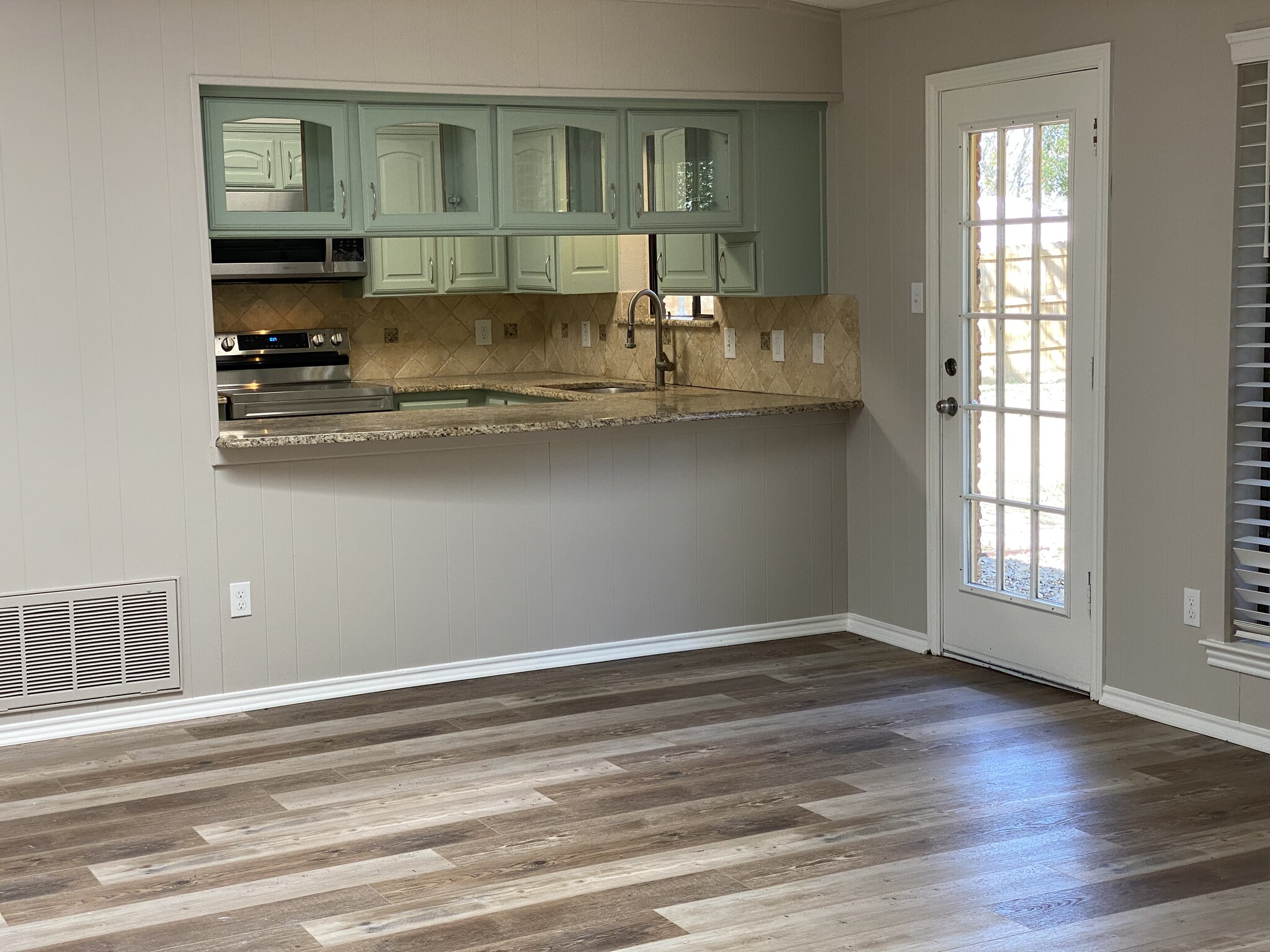 View of kitchen from living room. - 605 Scenic Dr